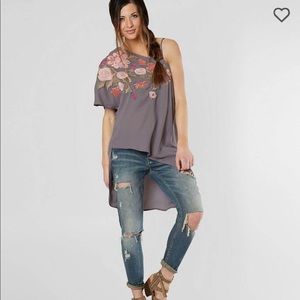Floral embroidered asymmetrical top
